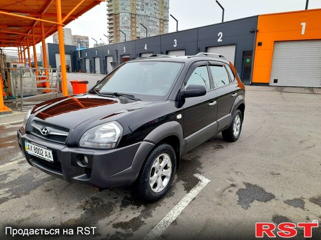 Черный Хендай Туксон, объемом двигателя 2 л и пробегом 109 тыс. км за 8799 $, фото 4 на Automoto.ua
