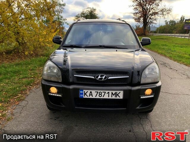 Черный Хендай Туксон, объемом двигателя 2 л и пробегом 220 тыс. км за 8000 $, фото 2 на Automoto.ua