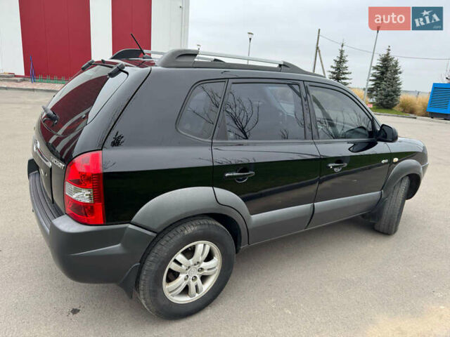 Чорний Хендай Туксон, об'ємом двигуна 1.98 л та пробігом 156 тис. км за 9200 $, фото 1 на Automoto.ua