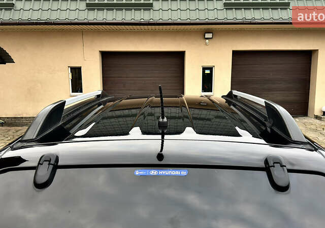 Чорний Хендай Туксон, об'ємом двигуна 2 л та пробігом 182 тис. км за 8299 $, фото 27 на Automoto.ua