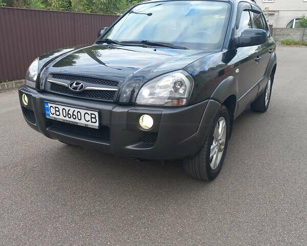 Черный Хендай Туксон, объемом двигателя 2 л и пробегом 168 тыс. км за 9000 $, фото 13 на Automoto.ua