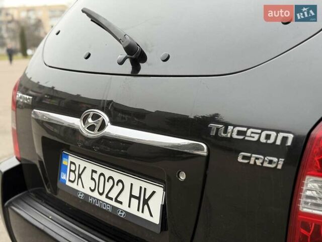 Черный Хендай Туксон, объемом двигателя 1.99 л и пробегом 240 тыс. км за 7200 $, фото 21 на Automoto.ua