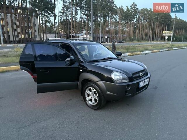 Чорний Хендай Туксон, об'ємом двигуна 1.98 л та пробігом 273 тис. км за 10000 $, фото 9 на Automoto.ua