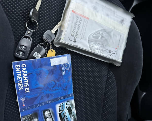 Черный Хендай Туксон, объемом двигателя 1.98 л и пробегом 96 тыс. км за 9900 $, фото 14 на Automoto.ua