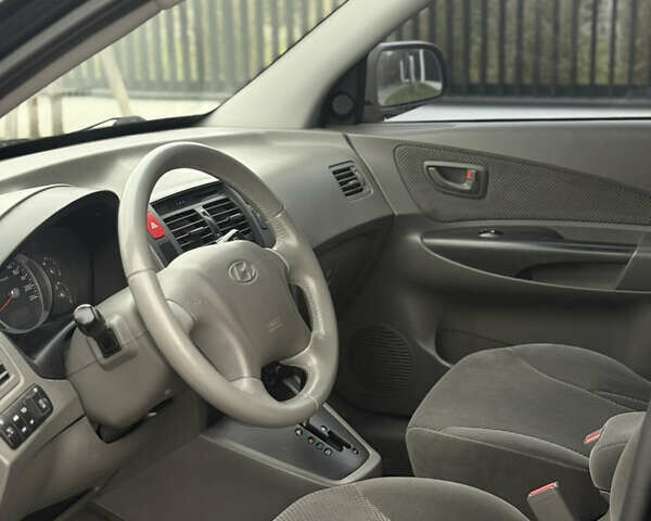 Чорний Хендай Туксон, об'ємом двигуна 2 л та пробігом 107 тис. км за 8500 $, фото 19 на Automoto.ua