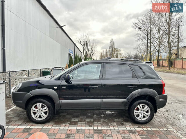 Чорний Хендай Туксон, об'ємом двигуна 2.66 л та пробігом 395 тис. км за 9950 $, фото 5 на Automoto.ua