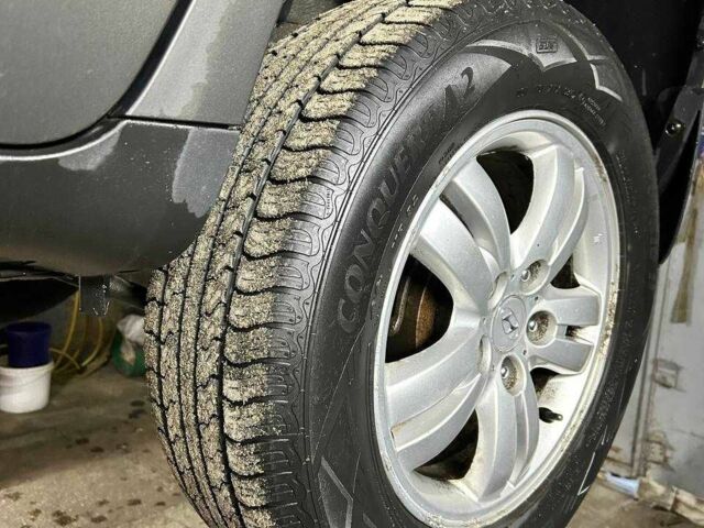 Черный Хендай Туксон, объемом двигателя 2 л и пробегом 220 тыс. км за 7000 $, фото 6 на Automoto.ua