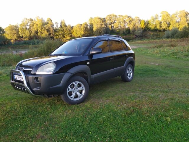 Черный Хендай Туксон, объемом двигателя 2 л и пробегом 162 тыс. км за 8500 $, фото 2 на Automoto.ua