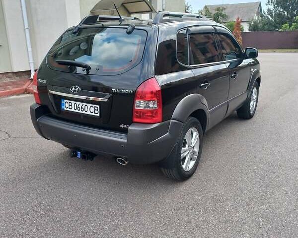 Черный Хендай Туксон, объемом двигателя 2 л и пробегом 168 тыс. км за 9000 $, фото 7 на Automoto.ua