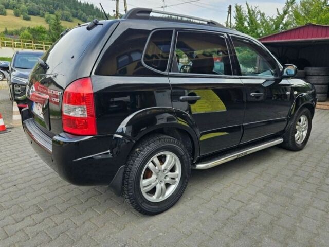 Черный Хендай Туксон, объемом двигателя 2 л и пробегом 287 тыс. км за 2400 $, фото 2 на Automoto.ua