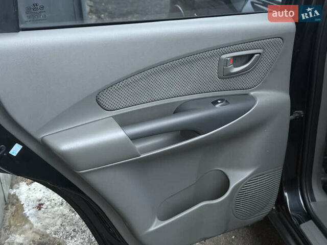 Чорний Хендай Туксон, об'ємом двигуна 2 л та пробігом 107 тис. км за 8500 $, фото 25 на Automoto.ua
