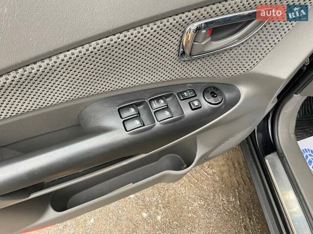 Чорний Хендай Туксон, об'ємом двигуна 1.98 л та пробігом 176 тис. км за 8500 $, фото 13 на Automoto.ua