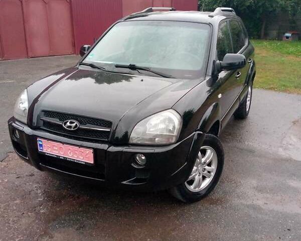 Чорний Хендай Туксон, об'ємом двигуна 2 л та пробігом 225 тис. км за 7850 $, фото 15 на Automoto.ua