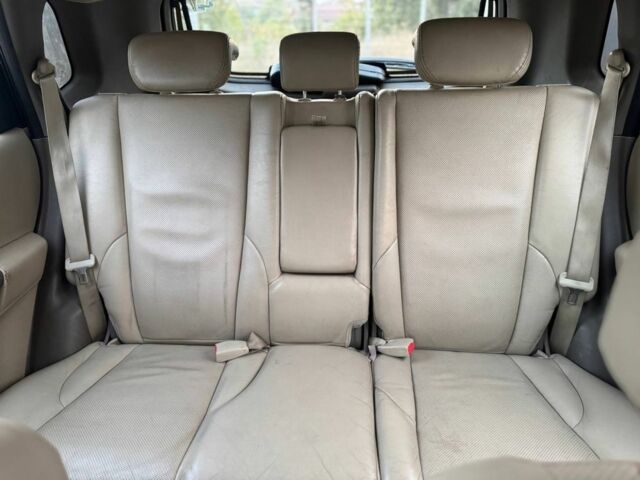 Черный Хендай Туксон, объемом двигателя 2 л и пробегом 353 тыс. км за 6800 $, фото 10 на Automoto.ua