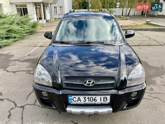 Черный Хендай Туксон, объемом двигателя 1.98 л и пробегом 172 тыс. км за 8500 $, фото 13 на Automoto.ua