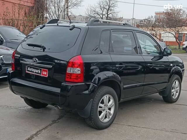 Чорний Хендай Туксон, об'ємом двигуна 2 л та пробігом 192 тис. км за 7990 $, фото 6 на Automoto.ua