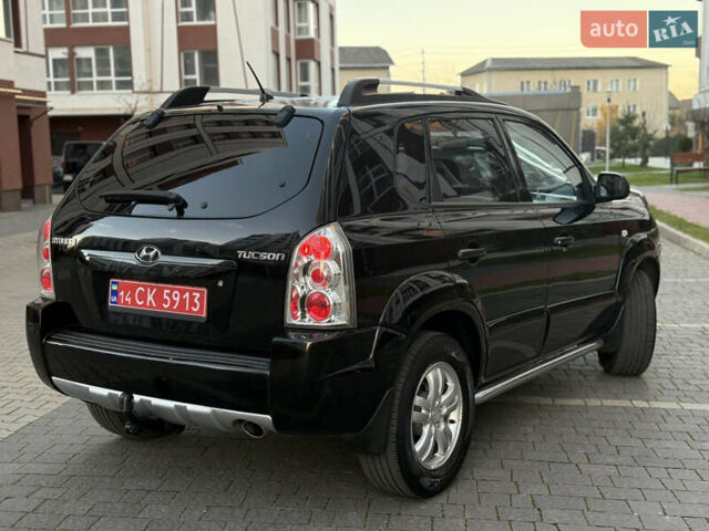 Чорний Хендай Туксон, об'ємом двигуна 2 л та пробігом 156 тис. км за 7850 $, фото 23 на Automoto.ua