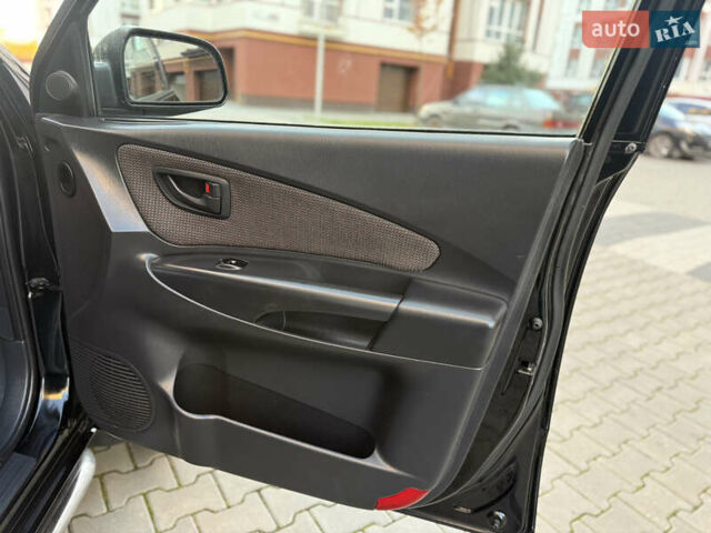 Чорний Хендай Туксон, об'ємом двигуна 2 л та пробігом 156 тис. км за 7850 $, фото 33 на Automoto.ua
