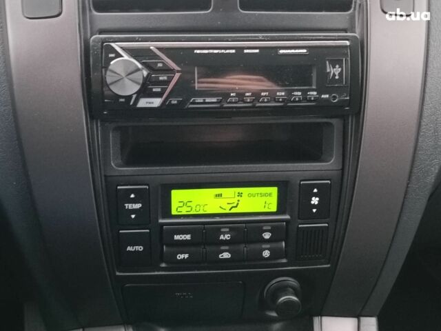 Чорний Хендай Туксон, об'ємом двигуна 2 л та пробігом 192 тис. км за 7990 $, фото 24 на Automoto.ua