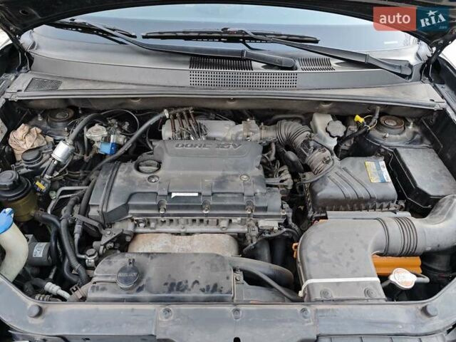 Черный Хендай Туксон, объемом двигателя 2 л и пробегом 182 тыс. км за 9000 $, фото 14 на Automoto.ua