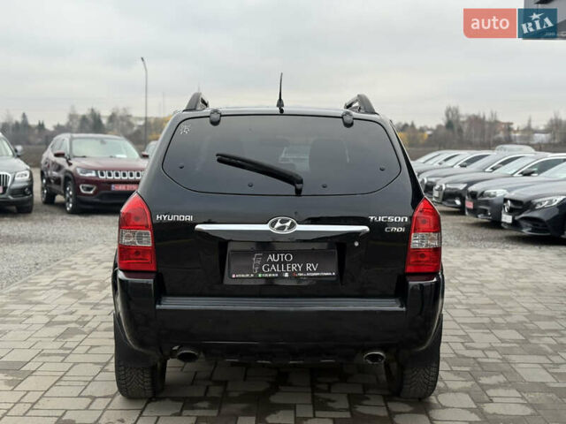 Чорний Хендай Туксон, об'ємом двигуна 2 л та пробігом 240 тис. км за 6888 $, фото 8 на Automoto.ua