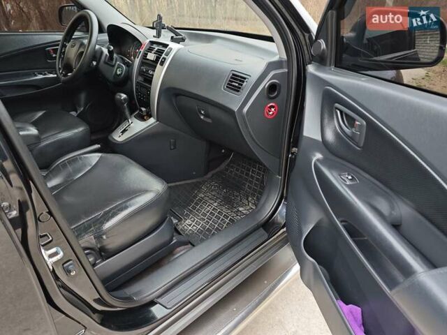 Черный Хендай Туксон, объемом двигателя 2 л и пробегом 182 тыс. км за 9000 $, фото 10 на Automoto.ua