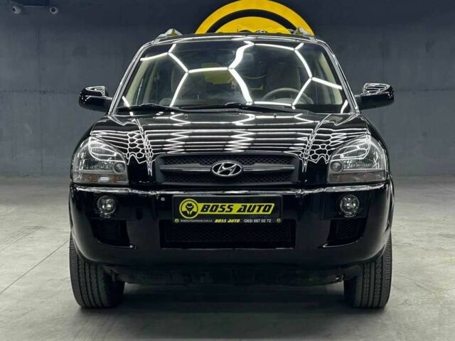 Черный Хендай Туксон, объемом двигателя 2 л и пробегом 224 тыс. км за 7800 $, фото 1 на Automoto.ua