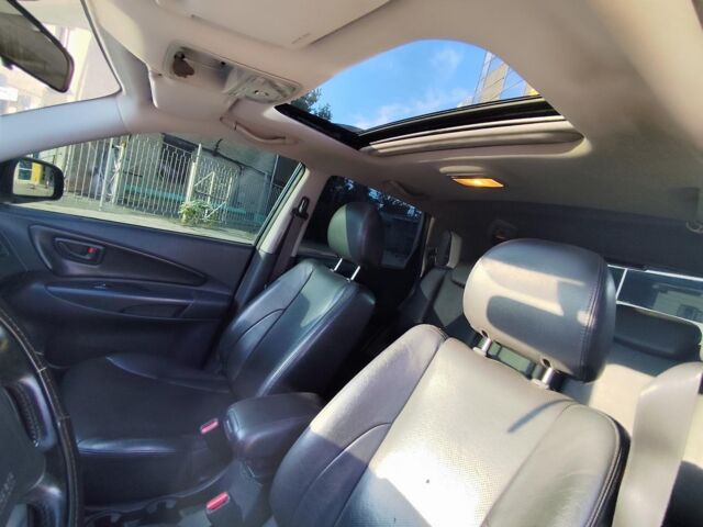 Черный Хендай Туксон, объемом двигателя 2 л и пробегом 82 тыс. км за 7490 $, фото 18 на Automoto.ua