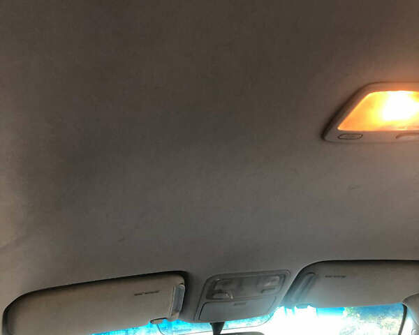 Черный Хендай Туксон, объемом двигателя 1.98 л и пробегом 256 тыс. км за 8200 $, фото 12 на Automoto.ua