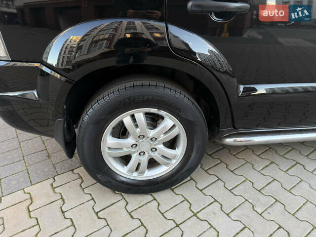 Чорний Хендай Туксон, об'ємом двигуна 2 л та пробігом 156 тис. км за 7850 $, фото 30 на Automoto.ua
