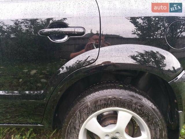 Чорний Хендай Туксон, об'ємом двигуна 1.99 л та пробігом 181 тис. км за 8150 $, фото 2 на Automoto.ua