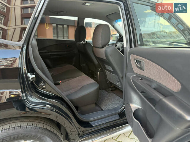 Чорний Хендай Туксон, об'ємом двигуна 2 л та пробігом 156 тис. км за 7850 $, фото 31 на Automoto.ua