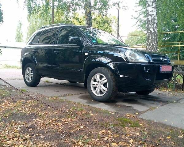 Черный Хендай Туксон, объемом двигателя 2 л и пробегом 224 тыс. км за 7900 $, фото 10 на Automoto.ua
