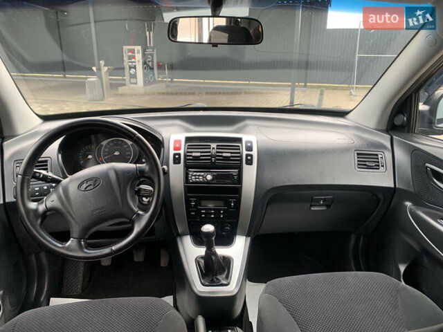 Черный Хендай Туксон, объемом двигателя 2 л и пробегом 198 тыс. км за 7500 $, фото 8 на Automoto.ua