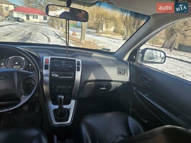 Чорний Хендай Туксон, об'ємом двигуна 2 л та пробігом 199 тис. км за 8500 $, фото 21 на Automoto.ua