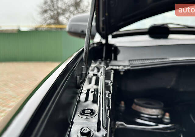 Чорний Хендай Туксон, об'ємом двигуна 2 л та пробігом 182 тис. км за 8299 $, фото 46 на Automoto.ua