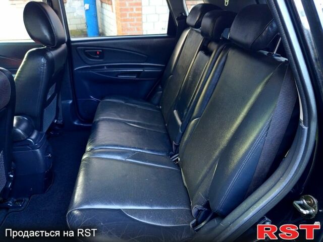 Черный Хендай Туксон, объемом двигателя 2 л и пробегом 187 тыс. км за 7900 $, фото 10 на Automoto.ua