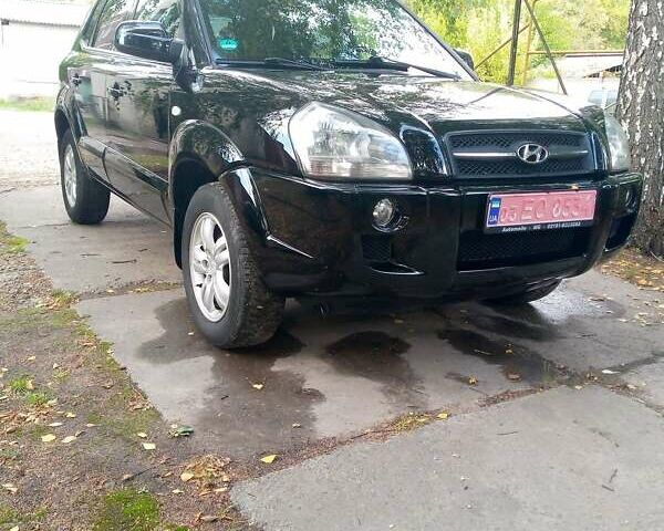 Черный Хендай Туксон, объемом двигателя 2 л и пробегом 224 тыс. км за 7900 $, фото 8 на Automoto.ua