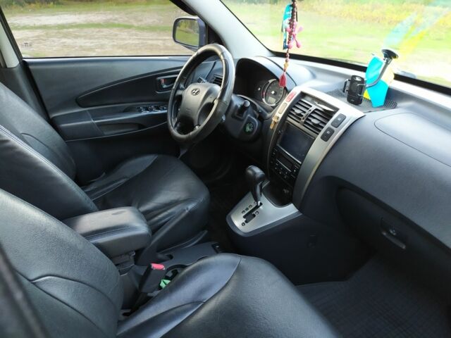 Черный Хендай Туксон, объемом двигателя 2 л и пробегом 162 тыс. км за 8500 $, фото 11 на Automoto.ua