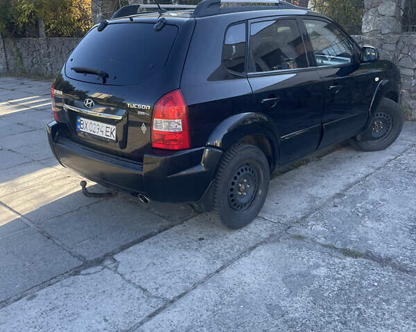 Черный Хендай Туксон, объемом двигателя 1.98 л и пробегом 262 тыс. км за 7900 $, фото 8 на Automoto.ua