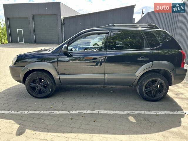 Чорний Хендай Туксон, об'ємом двигуна 1.98 л та пробігом 279 тис. км за 8200 $, фото 4 на Automoto.ua