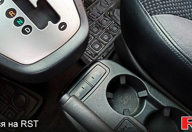 Чорний Хендай Туксон, об'ємом двигуна 2 л та пробігом 188 тис. км за 8800 $, фото 11 на Automoto.ua