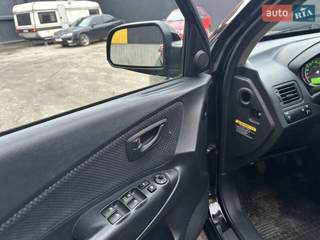 Чорний Хендай Туксон, об'ємом двигуна 2 л та пробігом 243 тис. км за 7999 $, фото 27 на Automoto.ua