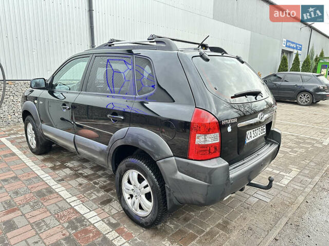 Чорний Хендай Туксон, об'ємом двигуна 2.66 л та пробігом 395 тис. км за 9950 $, фото 6 на Automoto.ua