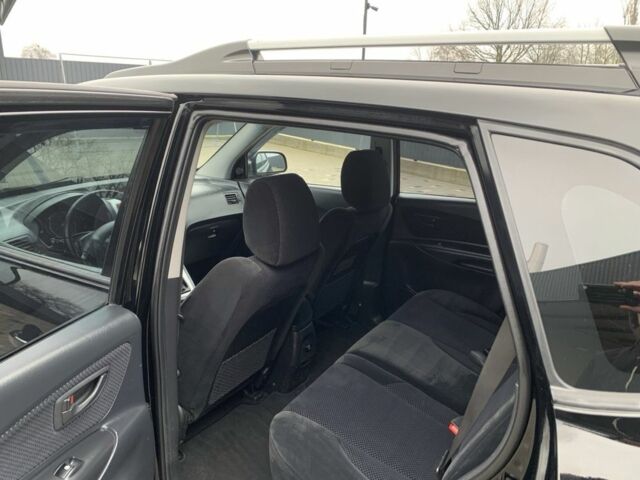 Черный Хендай Туксон, объемом двигателя 2 л и пробегом 198 тыс. км за 7500 $, фото 6 на Automoto.ua