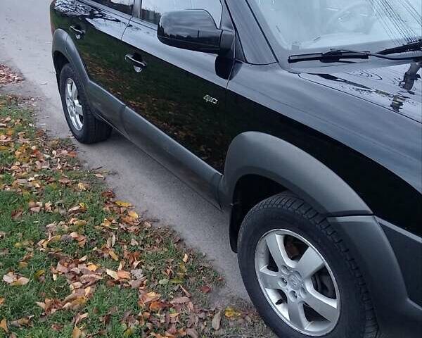 Хендай Туксон 2008 у Вінниці на Automoto.ua Чорний Хендай Туксон, об'ємом двигуна 1.98 л та пробігом 175 тис. км за 8800 $, фото 7 на Automoto.ua