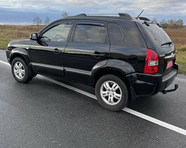 Черный Хендай Туксон, объемом двигателя 2 л и пробегом 253 тыс. км за 8299 $, фото 19 на Automoto.ua