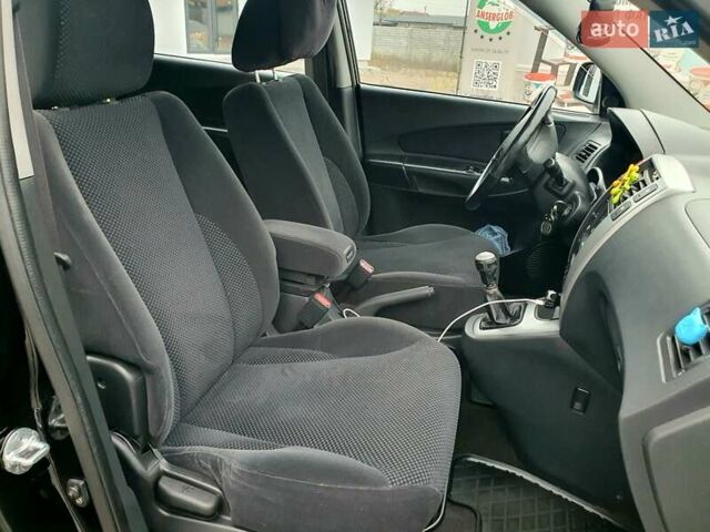 Чорний Хендай Туксон, об'ємом двигуна 2 л та пробігом 225 тис. км за 8000 $, фото 37 на Automoto.ua