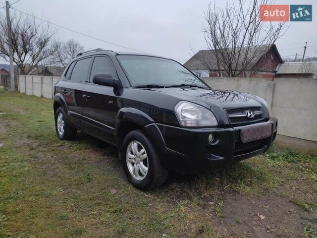 Черный Хендай Туксон, объемом двигателя 2 л и пробегом 237 тыс. км за 7500 $, фото 8 на Automoto.ua