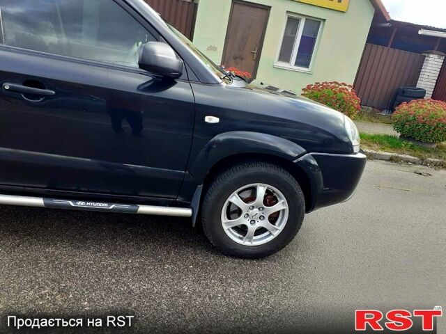 Черный Хендай Туксон, объемом двигателя 2 л и пробегом 240 тыс. км за 7500 $, фото 8 на Automoto.ua